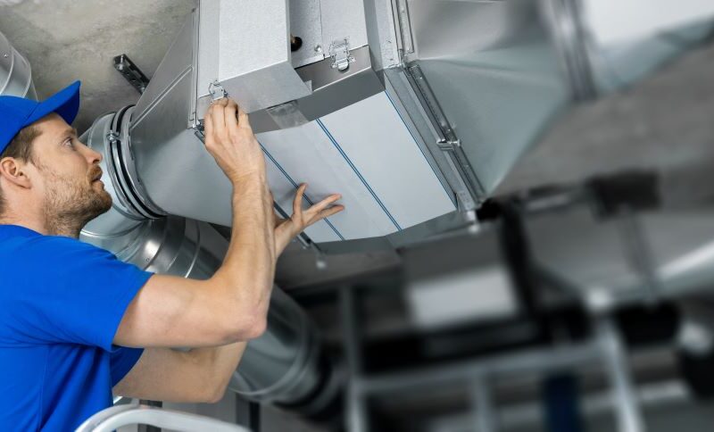 Man Working on HVAC system in Reno, Nevada