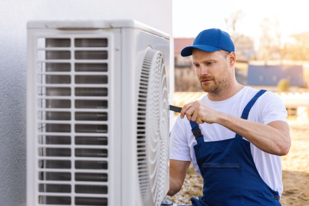 Technician working on HVAC system in Reno, Nevada