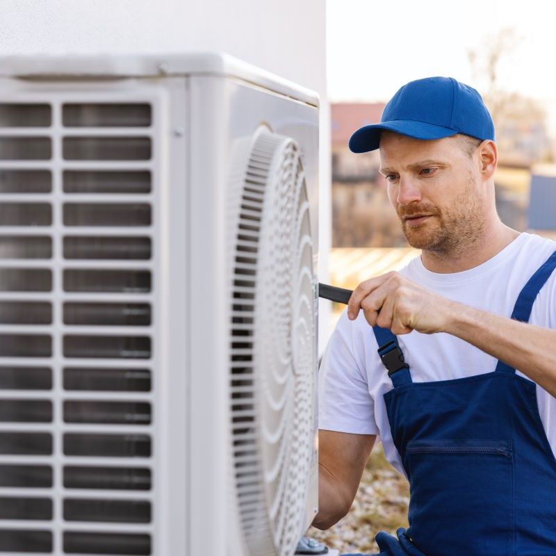 Technician working on HVAC system in Reno, Nevada
